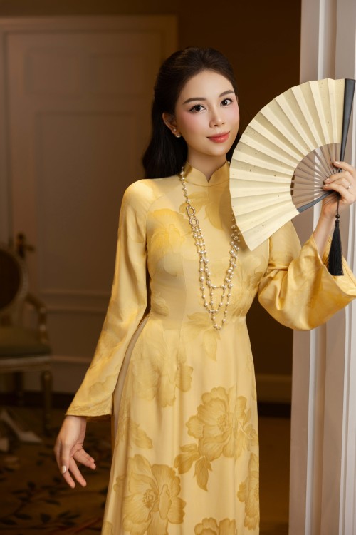 Sixdo Light Yellow Silk Ao Dai